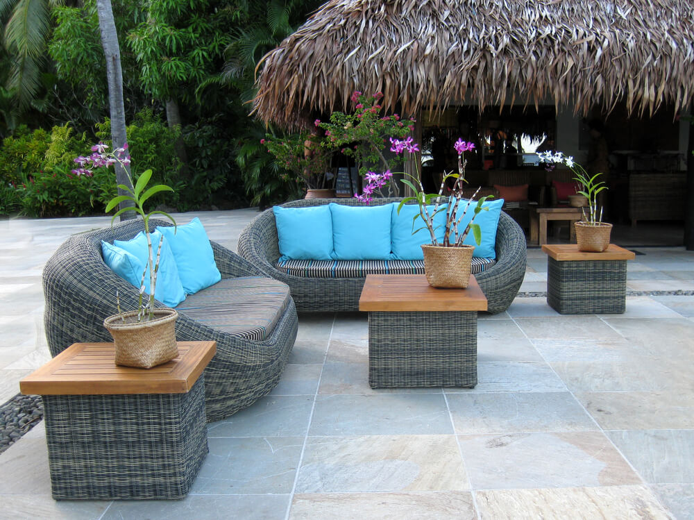 Rattan furniture in tropical setting.