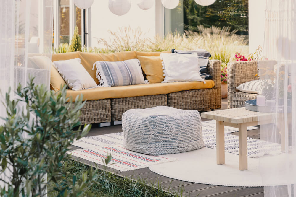 Stylish outdoor relax area with garden furniture.