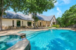 A home backyard with a swimming pool.